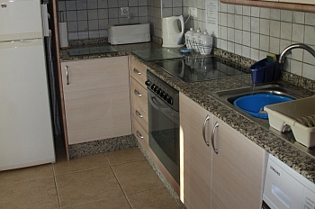 The kitchen in the Sunrise Apartment